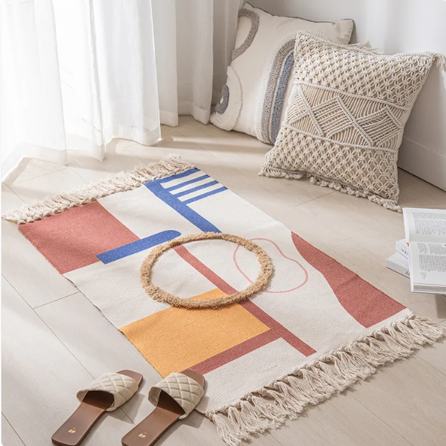 Contemporary minimalist area rug by Limestoneshop featuring a neutral geometric pattern on soft, textured fabric.