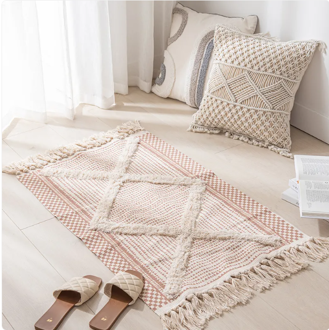 Contemporary minimalist area rug from Limestoneshop featuring neutral tones and simple geometric patterns for modern home decor.