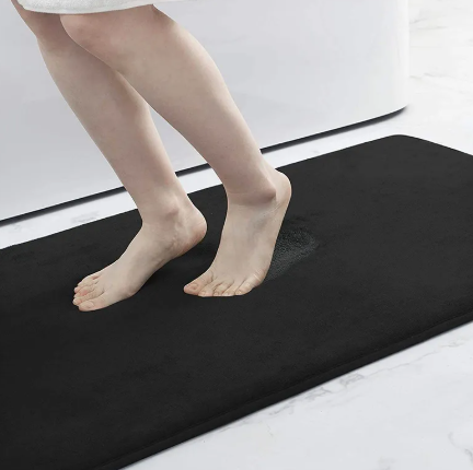 Soft beige memory foam rug by Limestoneshop with plush, cushioned surface ideal for cozy living spaces.
