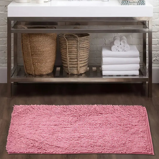 Soft pink chenille non-slip bath rug from Limestoneshop, plush texture, ideal for bathroom decor and safety.